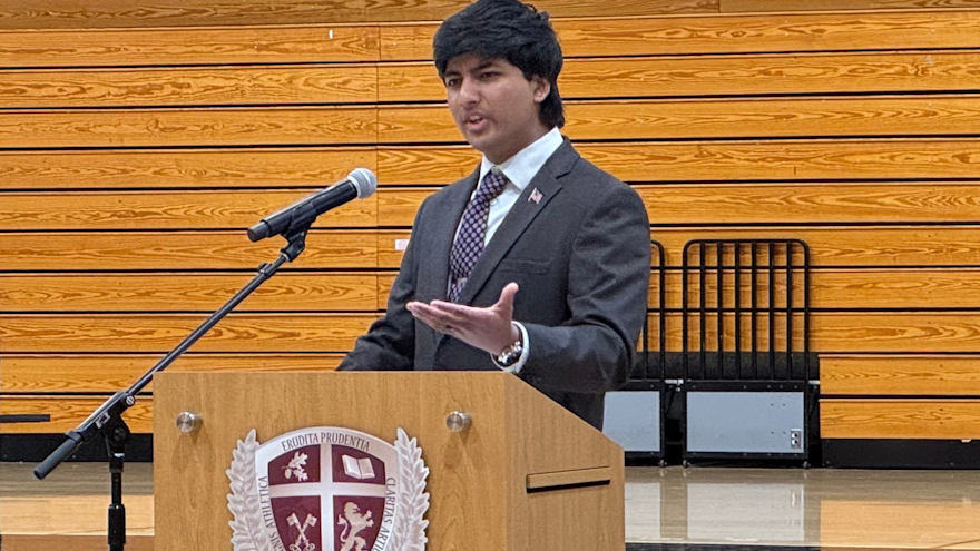 Rohan Student at podium