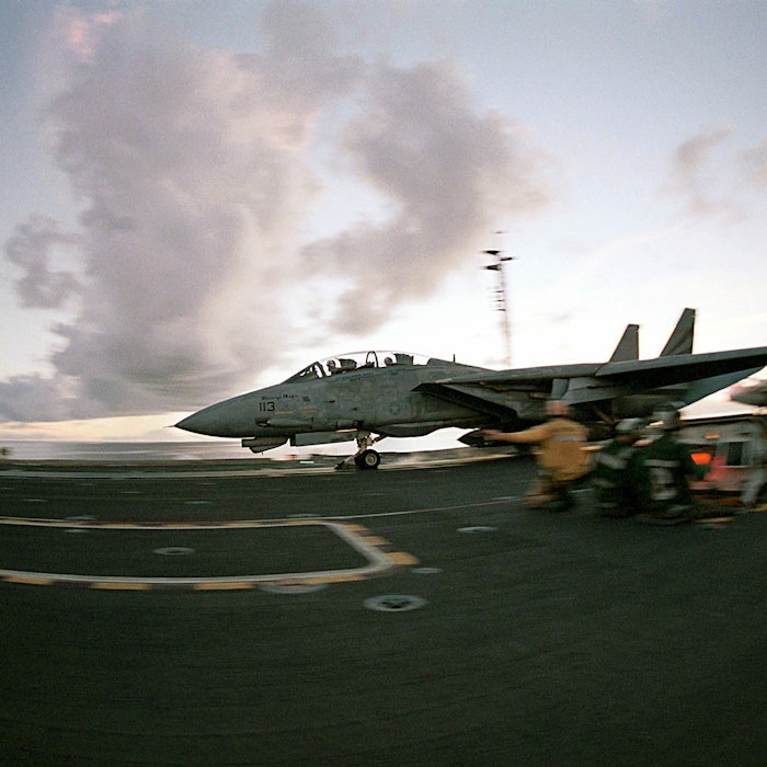 An F-14 "Tomcat" launches from the flight deck of the USS KITTY HAWK (CV 63) An F-14 "Tomcat" launches from the flight deck of the USS KITTY HAWK (CV 63)