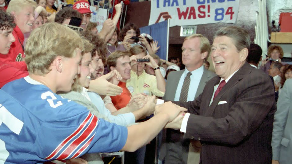 Reagan shaking hands with the youth