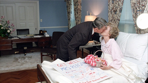 Ronnie kissing Nancy while she's sick in bed Ronnie kissing Nancy while she's sick in bed