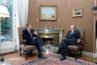 Reagan and Gorbachev talking near fireplace. Reagan and Gorbachev talking near fireplace.