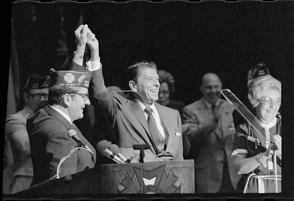 Reagan's Hand Being Raised by Military Official After Speech