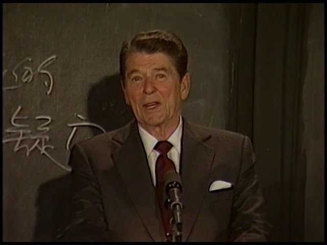 Reagan speaking into microphone