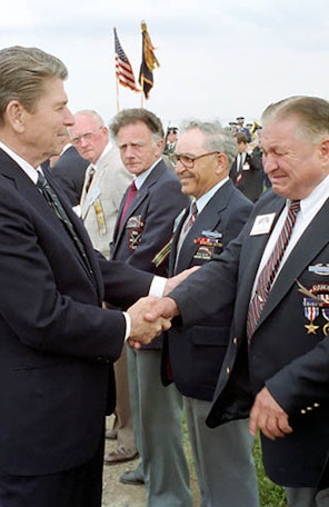 Reagan shaking hands with veterans d-day Reagan shaking hands with veterans