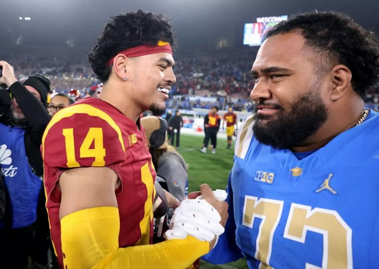 photo Wally Skalij / Los Angeles Times USC quarterback Jayden Maiava is congratulated by UCLA offensive lineman Alani Makihele after the rivals’ game at the Rose Bowl on Nov. 23. (Wally Skalij / Los Angeles Times)