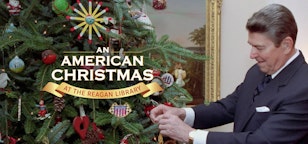 Ronald Reagan decorates a Christmas tree