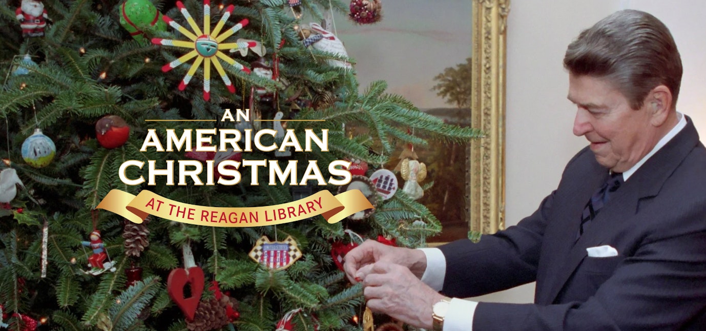 Ronald Reagan decorates a Christmas tree