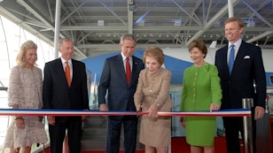 Nancy Reagan cut the ribbon to officially open the Air Force One Pavilion at the Ronald Reagan Library on October 21, 2005. President George W. Bush and First Lady Laura Bush joined her for the ceremony. Nancy Reagan cut the ribbon to officially open the Air Force One Pavilion at the Ronald Reagan Library on October 21, 2005. President George W. Bush and First Lady Laura Bush joined her for the ceremony.