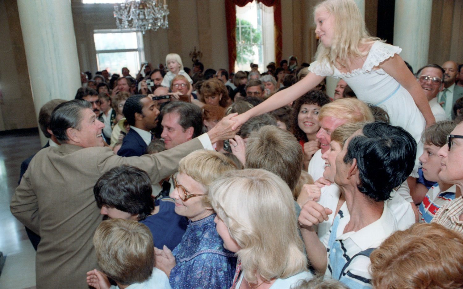 8/17/1982 President Reagan shaking hands with a visitor to the White House