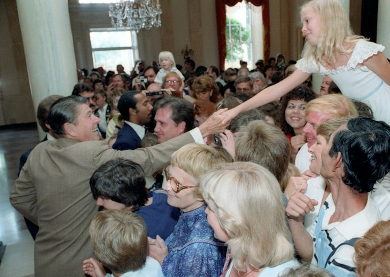 8/17/1982 President Reagan shaking hands with a visitor to the White House