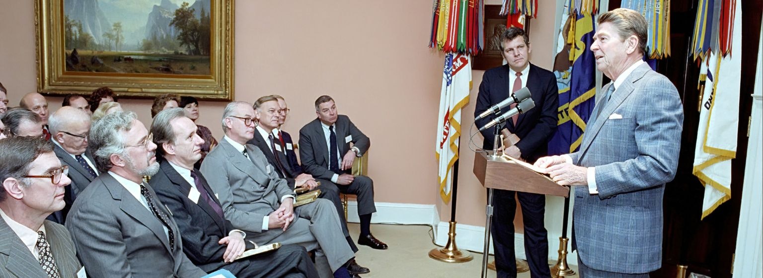 President Reagan participates in a photo opportunity with William J. Bennett, Chairman of the National Endowment for the Humanities.