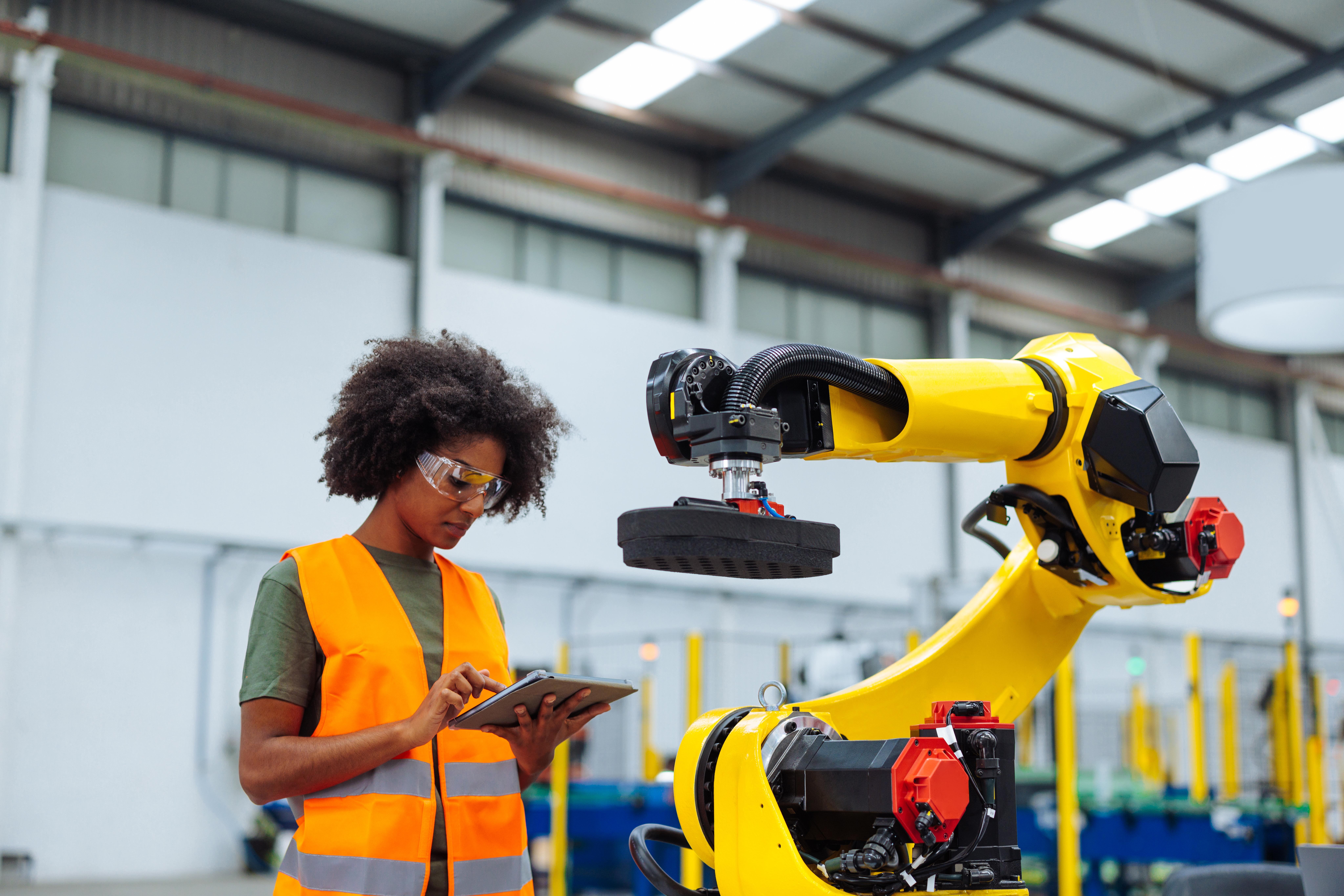 Woman working on a robotic arm