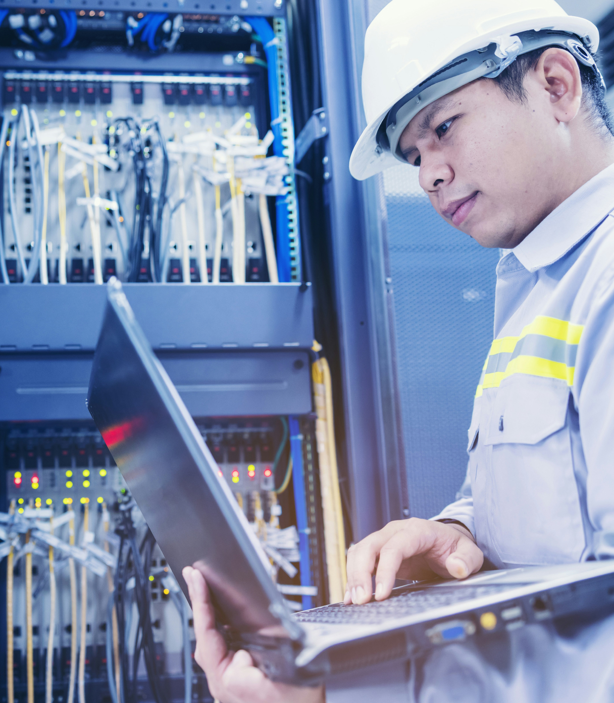 A man working on an electrical system