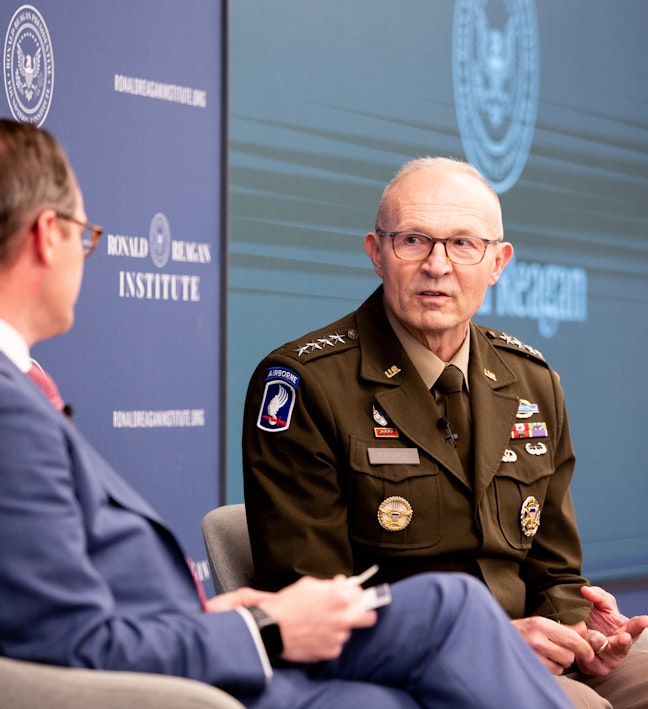 Mr. Roger Zakehim moderates a conversation with General Randy George