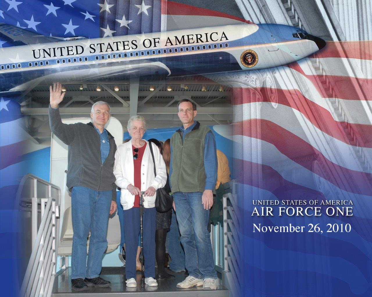 Henry Apgar waving with family, in front of Air Force One