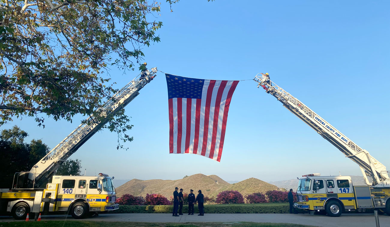 Ventura County Fire Department raising an American flag