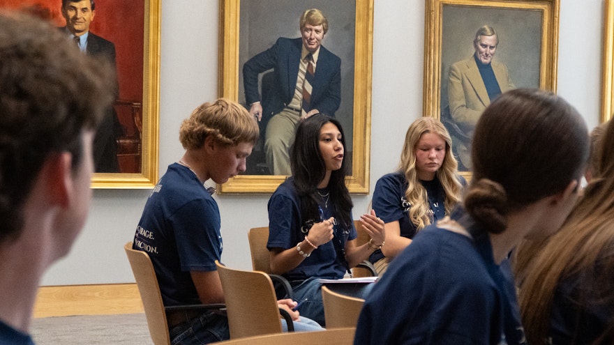 Students in round table discussion