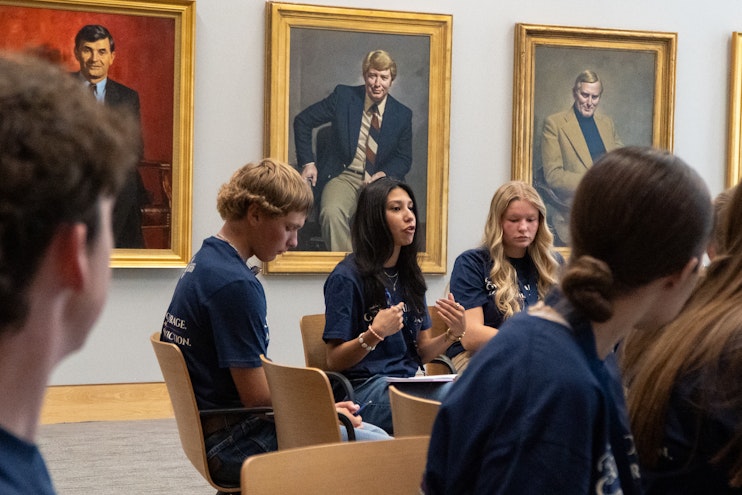 Students in round table discussion