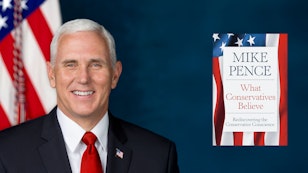 Vice President Mike Pence with book cover of What Conservatives Believe Vice President Mike Pence with book cover of What Conservatives Believe