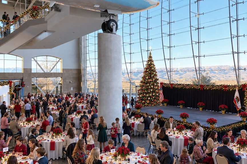 Guests eating lunch under Air Force One at the Reagan Library