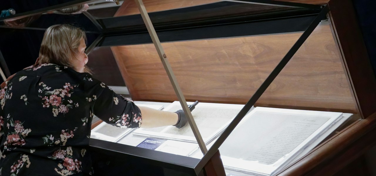 NARA staff placing documents for display