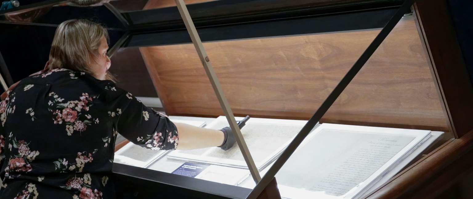 NARA staff placing documents for display