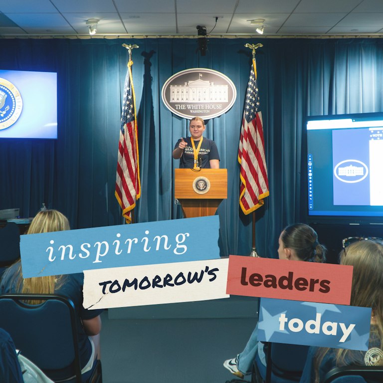 Student speaking at a podium